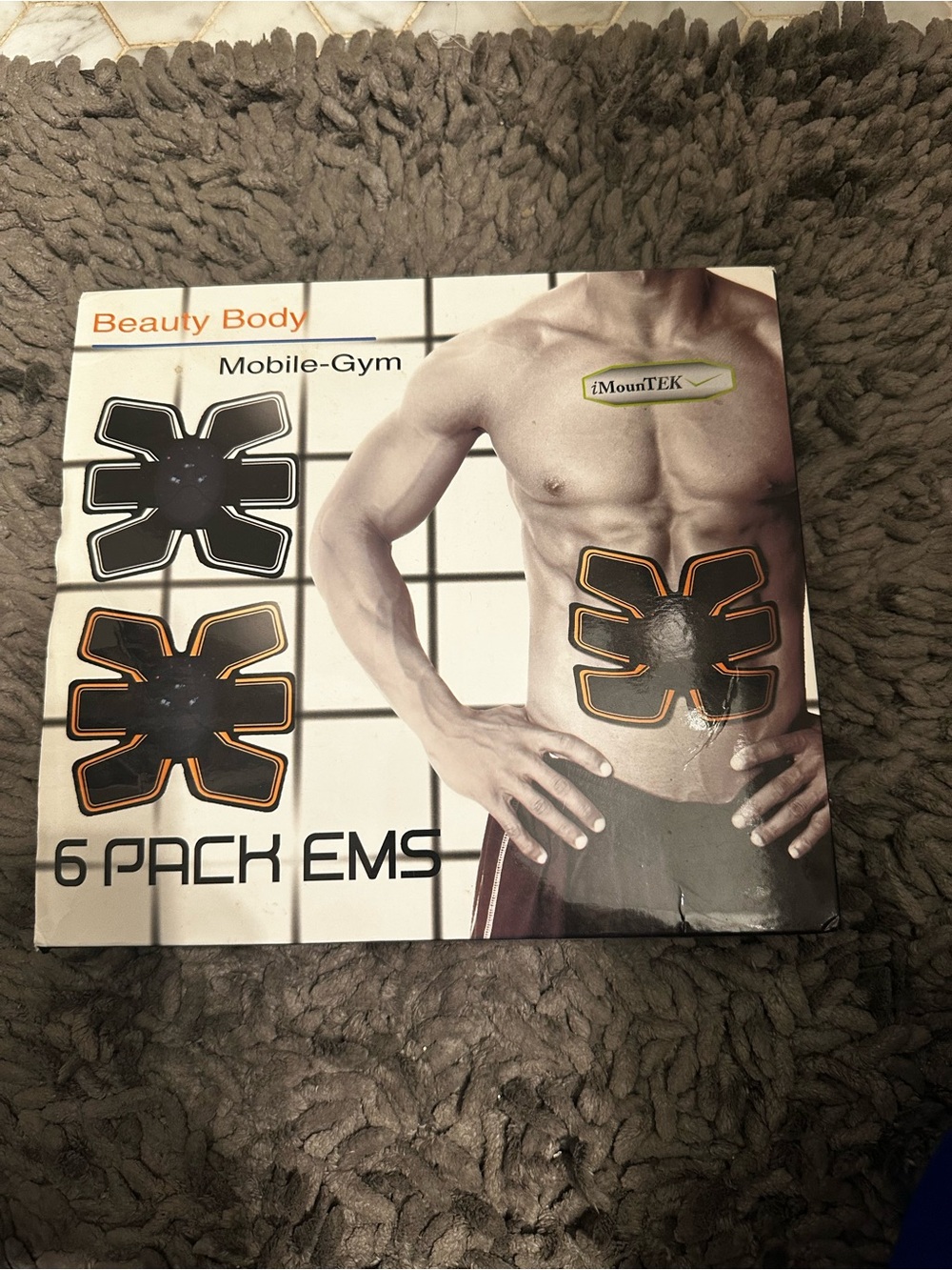 6-Pack EMS Abs Trainer Pads in Black with Orange Trim